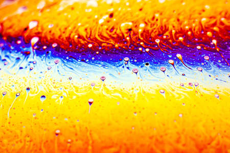 Beautiful psychedelic abstraction formed by light on the surface of a soap bubble.の写真素材