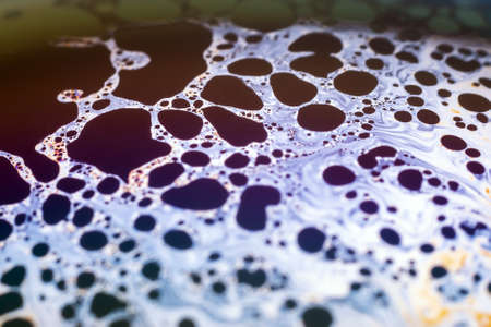 Beautiful psychedelic abstraction formed by light on the surface of a soap bubble.