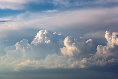 Beautiful stormy cumulus clouds in the sky, background
