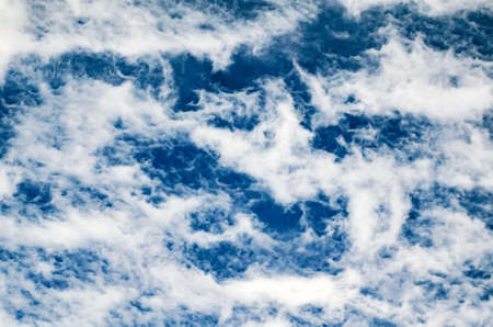 Beautiful fluffy clouds against the blue sky.の写真素材