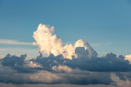 Beautiful stormy cumulus clouds in the sky, background