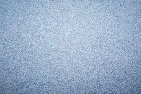 Abstract frosty pattern on glass, background texture.の写真素材