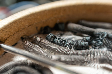 Disassembled electric burner with burned out heating elements, wires and cables.の写真素材