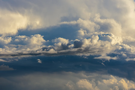 Beautiful stormy cumulus clouds in the sky, background
