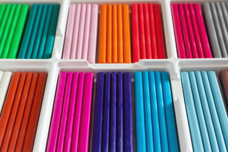 Multi-colored plasticine in a box, for artistic modeling and development of children's creativity.