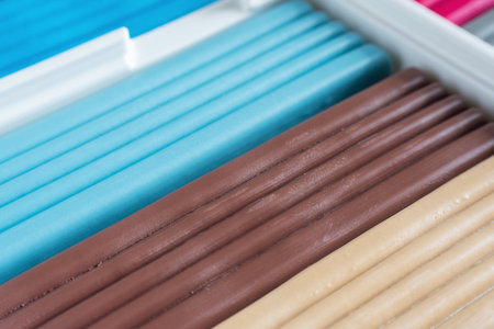 Multi-colored plasticine in a box, for artistic modeling and development of children's creativity.