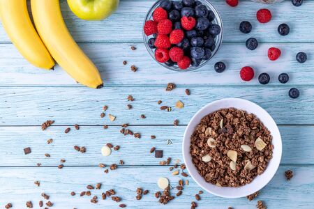 Muesli with berries on the tableの写真素材