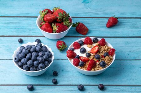 Muesli with greek yogurt on the tableの写真素材