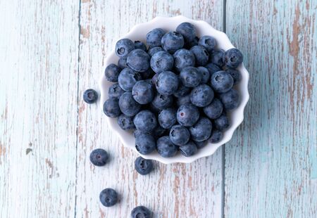 Berries, summer fruits on a wooden table. Healthy lifestyle concept.の写真素材