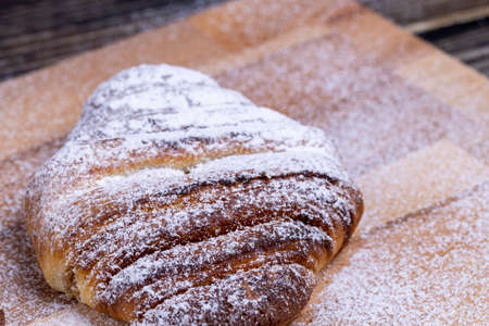 Sweet buns sprinkled with powdered sugarの写真素材