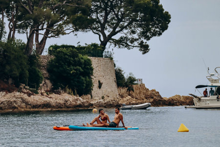 Saint-Jean-Cap-Ferrat, France - 01 June 2023: People are resting on Fosses beach, one of the most beautiful beaches in Saint-Jean-Cap-Ferratのeditorial素材