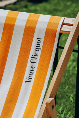 Monaco, Monaco - 25 June 2023: Chaise lounge branded Veuve Clicquot near the hotel Hermitage in...