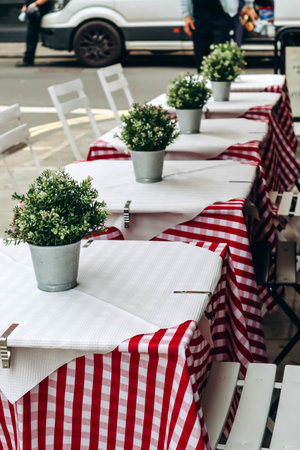 Tables on a terrace in a restaurant in Soho in Londonのeditorial素材