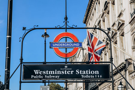 London, United Kingdom - September 25, 2023: Tube sign at the entrance to Westminster Station in...
