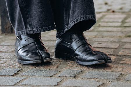 London, United Kingdom - September 25, 2023: Close-up of Maison Margiela's iconic Tabi bootsのeditorial素材