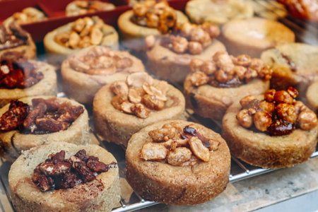 Close-up of fresh and beautiful french pastries in a bakery showcaseの写真素材