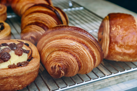 Close-up of fresh and beautiful French pastries in a bakery showcase