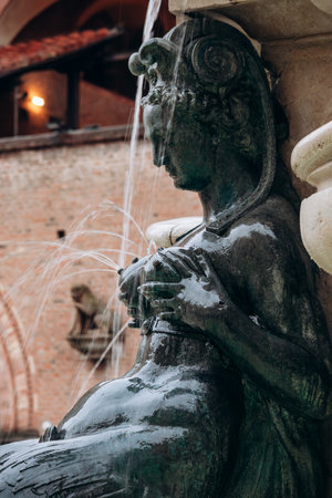 Bologna, Italy - October 6, 2024: Fontana del Nettuno (Fountain of Neptune) with its mermaidsの写真素材