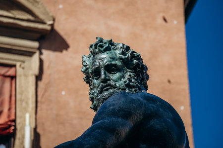 Bologna, Italy - October 6, 2024: Neptune's Fountain located in the eponymous square, Piazza del...
