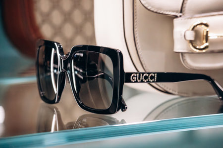 Cannes, France - 10 November 2024: Close-up of Gucci glasses in a boutique window on the Croisette promenade in Cannesのeditorial素材