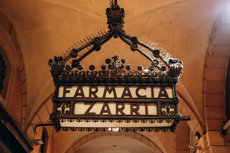 Bologna, Italy - October 6, 2024: Vintage pharmacy sign (Farmacia Zarri) in central Bolognaのeditorial素材