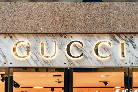 Bologna, Italy - October 6, 2024: Signboard for the Gucci boutique in Galleria Cavour in Bolognaのeditorial素材