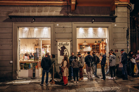Bologna, Italy - October 6, 2024: Queue at the restaurant "Sfoglia Rina" in the center of Bolognaのeditorial素材
