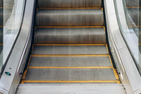 Nice, France - 6 January, 2024: Close-up of an escalator at a train station in Niceの写真素材