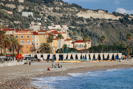 Menton, France - 6 January, 2024: Evening view of the city of Menton and its coastal areaのeditorial素材
