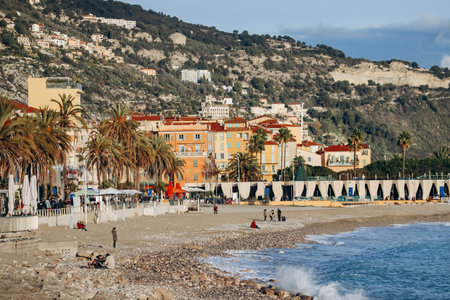 Menton, France - 6 January, 2024: Evening view of the city of Menton and its coastal areaのeditorial素材