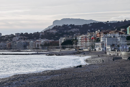 Menton, France - 6 January, 2024: Evening view of the city of Menton and its coastal areaのeditorial素材