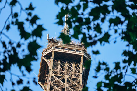 Paris, France - 15 July 2021: Close-up of a fragment of the Eiffel Tower during the golden hour