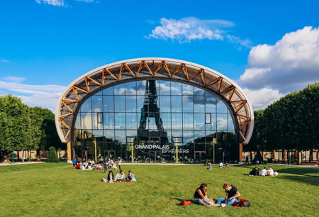 Paris, France - July 15, 2021: Grand Palais Ephemere in front of the Eiffel towerのeditorial素材