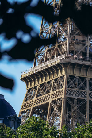 Paris, France - 15 July 2021: Close-up of a fragment of the Eiffel Tower during the golden hour