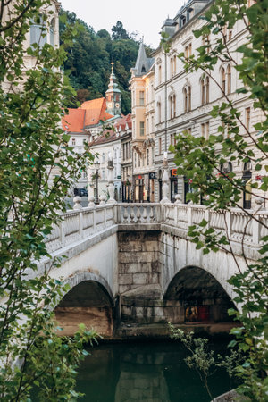 Ljubljana, Slovenia - August 14, 2024: The Triple Bridge in the center of Ljubljana, built in 1842の写真素材