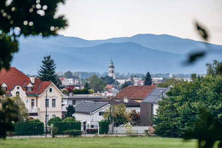 A Beautiful View with Mountains in the Background and Out-of-Focus Foliage in the Foregroundの写真素材