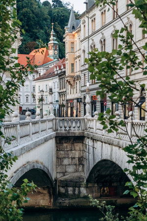 Ljubljana, Slovenia - August 14, 2024: The Triple Bridge in the center of Ljubljana, built in 1842の写真素材