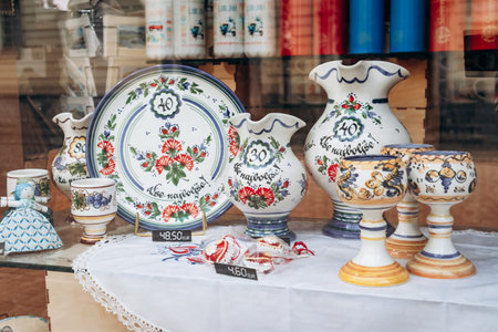Ljubljana, Slovenia - August 14, 2024: Slovenian Ceramic Tableware Displayed in a Shop Windowのeditorial素材