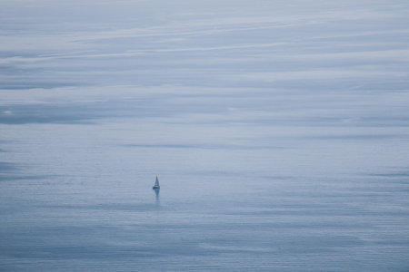 Sailboat in the Mediterranean Sea near the shores of the French Rivieraの写真素材