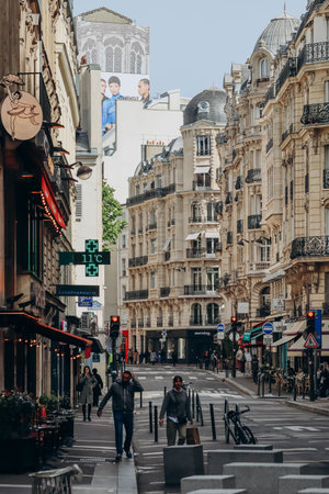 Paris, France - 16 April 2023: Beautiful Parisian street near the famous Galeries Lafayette in the 9th arrondissementのeditorial素材