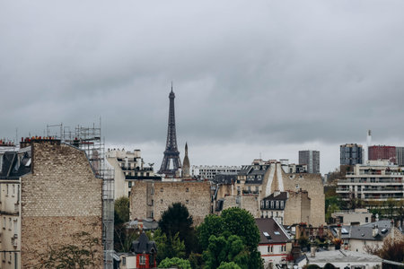 View of the Parisian rooftops and the Eiffel Tower from the 16th arrondissement of Parisの写真素材