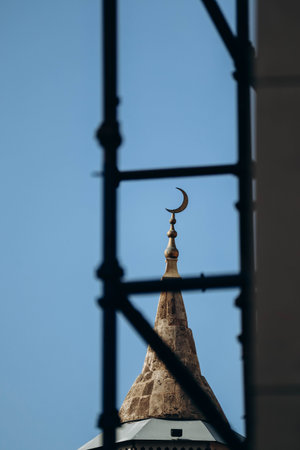 Mosque dome and scaffolding, out of focus on purpose