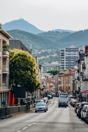 Clermont-Ferrand, France - 21 June 2023 : Beautiful street in the heart of Clermont Ferrand, with the Puy de Dome behindのeditorial素材