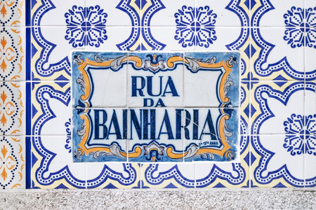 Porto, Portugal - December 28, 2024: A street name decorated with azulejos in central Porto, Portugalの写真素材