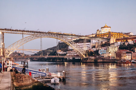 Porto, Portugal - December 28, 2024: The Dom Luis I Bridge, a double-deck metal arch bridge that spans the river Douro between the cities of Porto and Vila Nova de Gaia in Portugal.のeditorial素材