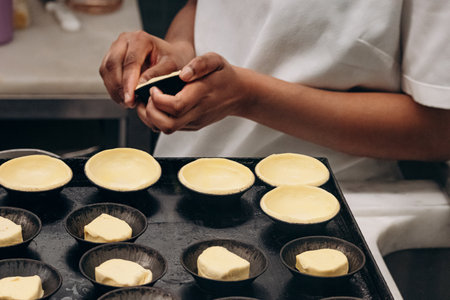 The process of making traditional pasteis de nata in Lisbon, Portugal