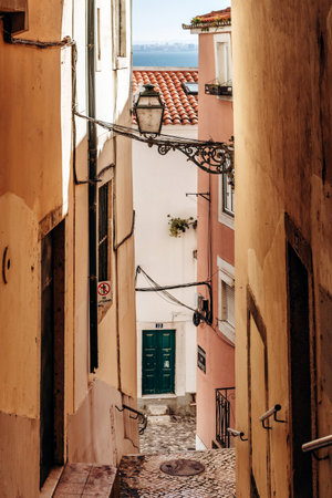 Narrow and picturesque streets of the Alfama district in Lisbon