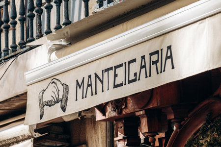 Lisbon, Portugal - December 28, 2024: Sign of the famous Manteigaria in Lisbon, known for its...