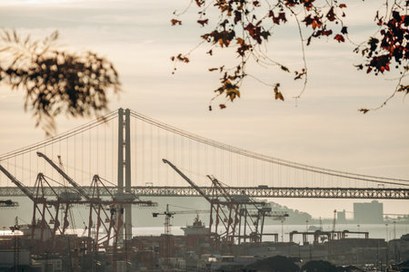 Lisbon, Portugal - January 2, 2025: A beautiful view of the iconic 25 de Abril Bridge in Lisbon,...