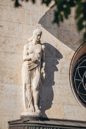 Ljubljana, Slovenia - August 15, 2024: Sculpture on the facade of a historic building in central Ljubljanaの写真素材